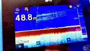 On my AXIOM+ you can see a lure first rising, then falling, and rising again being attacked a few feet off the bottom by a fish that remains hooked. Axiom